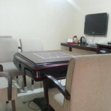 Xinhang Hotel Urumqi Buitenkant foto