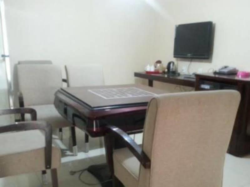 Xinhang Hotel Urumqi Buitenkant foto