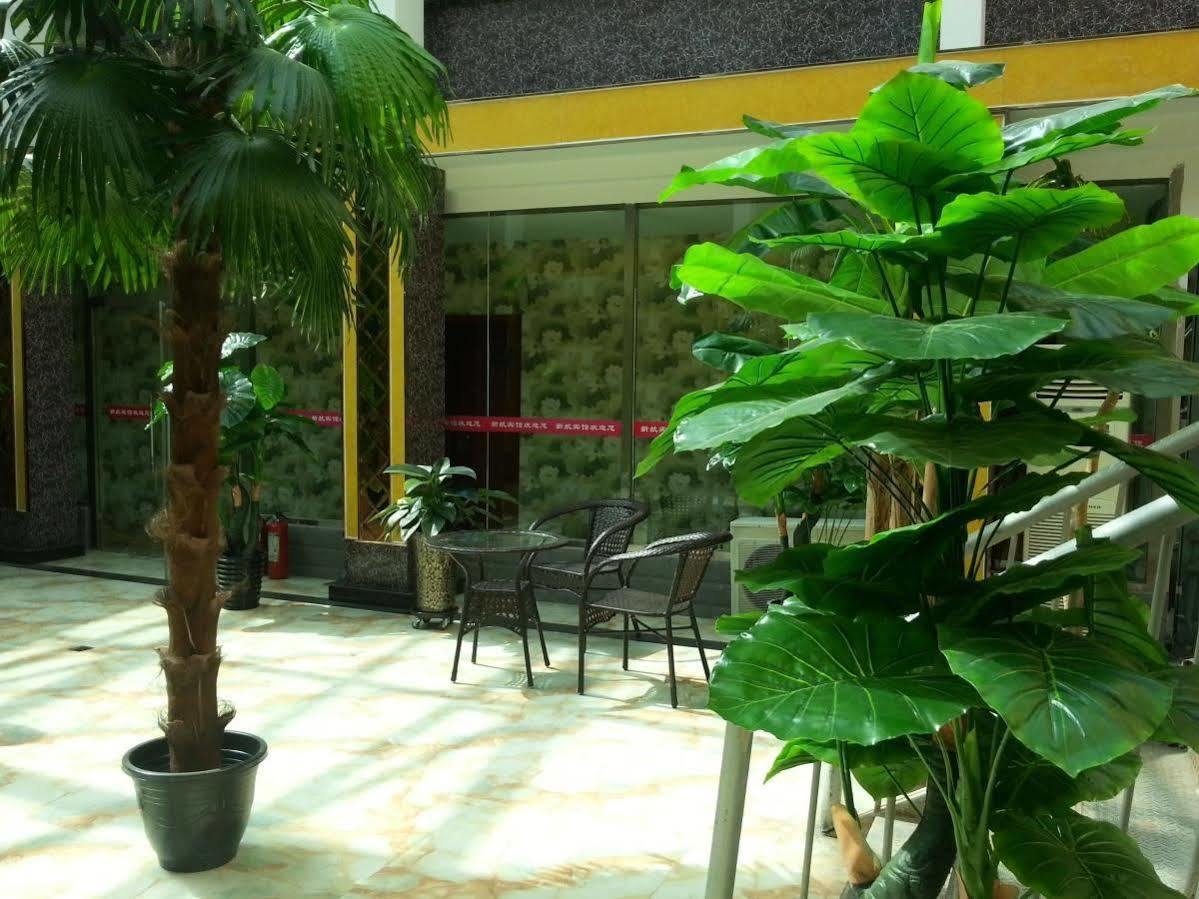 Xinhang Hotel Urumqi Buitenkant foto